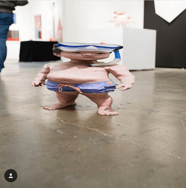 Creepy kid sculpture, made to look distorted, by X Yi Hwan-Kwon
